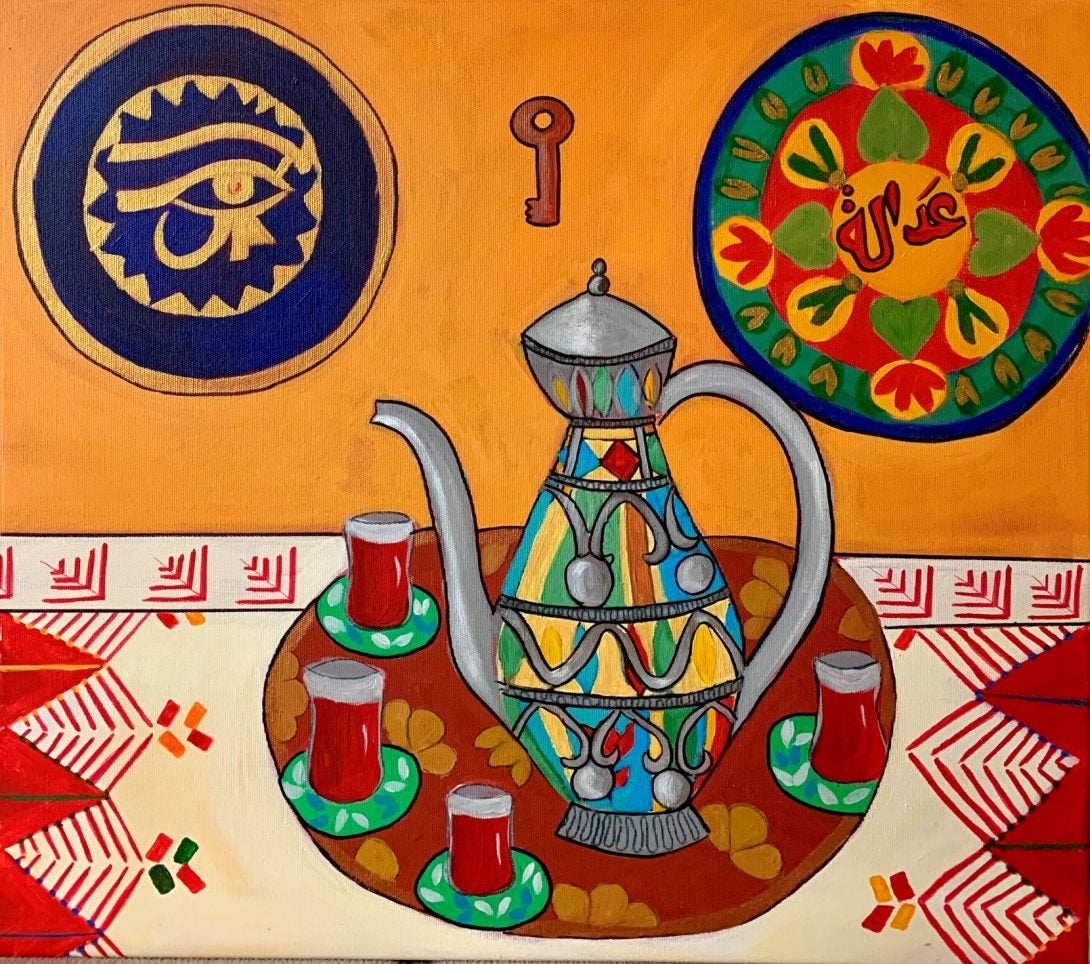 Image of a painting with two thirds orange wall that has three hanging items. On the right is an embroidered flowery circular item with Arabic writing in the center. The center hanging is a small key. on the right is a circular plate in blue color with the eye of horus in gold. the bottom third shows an embroidered tablecloth in red, white, green and organce with a decorated tray that has four small tea cups with saucers and a large tea pot engraved in various colors